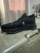 On Running On x Loewe Cloudtilt "All Black", front photo